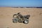 Quad bike stands on the shore of the Gulf of Aqaba. Dahab, South Sinai Governorate, Egypt