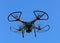 Quad Copter Drone on a blue background