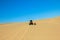 Quad driving people - two happy bikers in sand desert dunes, Africa, Namibia, Namib, Walvis Bay, Swakopmund.