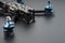 Quadcopter with carbon frame, motors on a dark background