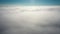The quadcopter flies in the clouds