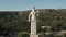 Quadcopter fly to the Kartlis Deda, Mother of Georgia statue in capital of Georgia, Tbilisi. From bottom to top view