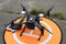 Quadcopter placed on landing pad before launching