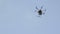 Quadcopter rises up against flying fly the sky.