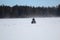 Quading Across a Windy Lake In Winter