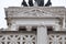 Quadriga of Unity crop view on Vittoriano Propylaea national monument in Rome, Italy