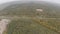 Quadrocopter, flying over the autumn forest. Autumn cloudy day.