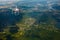 Quadrocopter flying over farmland