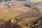 Quadrocopter flying over farmland