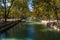 Quai Jules Philippe, a canal in the shade of plane trees, on Lake Annecy, in Haute Savoie, France