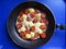 Quail eggs with cherry tomatoes.