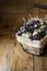 Quail eggs in a lined wire basket, on straw, with lavender twigs, Easter, rustic interior