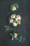 Quail eggs in metal molds and dried flowers for Easter