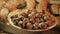 Quail eggs in a plate on the background of quails