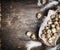 Quail eggs in rustic Basket on dark wooden background