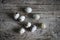 Quail eggs, whole on the wooden, rustic desk