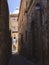 Quaint cobbled street in a cityscape of Caceres, Spain