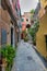 Quaint cobblestone alleyway in a historic part of Vernazza, Cinque Terre, Italy