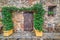 Quaint corner with wooden bench in Monteriggioni