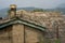 A quaint, old structure with stone walls,chimney roof slanting stone roofs  Almora