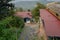 A quaint, old structure with stone walls,chimney roof slanting stone tin roofs  Almora Uttarakhand