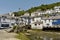 Quaint white washed buildings of  Polperro Cornwall UK
