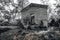 Quaint wooden barn in disrepair with a 'no trespassing' sign amongst the trees