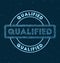 Qualified. Glowing round badge.