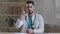 Qualified male arabian intern doctor practitioner therapist psychiatrist man guy warn about health care virus infection