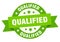 qualified round ribbon isolated label. qualified sign.