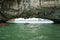 Quang Ninh, Vietnam - Aug 12, 2017: Halong bay in Vietnam, UNESCO World Heritage Site, with tourist paddling kayak