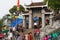 Quang Ninh, Vietnam - Mar 22, 2015: Crowded people at gate of Giac Tam zen monastery, Cau Bau pagoda in festive days