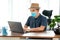 Quarantine, asian man wearing face protective medical mask for protection from virus disease with laptop computer working at home