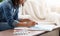 Quarantine Leisure. Closeup Of Young African Woman Drawing Picture At Home