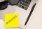 Quarantine, message on yellow sticky note. Creative work space. Work from home concept