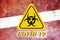 Quarantine sign COVID 19 on the background of the flag of Latvia