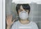 Quarantined child by the Coronavirus pandemic with mask medical