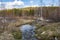 Quarry, rocks and lake in spring