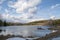 Quarry, rocks and lake in spring