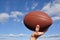 Quarterback Passing an American Football