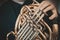 Quartet of brass instruments - Brass instruments - Close-up of hands - slight desaturation