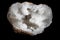 Quartz crystal geode isolated on black background