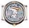 Quartz wristwatch movement in old clock isolated