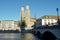 Quay Bridge in Zurich in lateral view with Grossmunster cathedral on the Limmat River bank