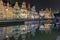 Quay Korenlei with reflections in Ghent town at night, Belgium