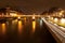 Quay and pont au change in Paris at night