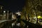 Quays of Lieve canal with Castle of the counts in the background in Ghent at night