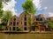 Quays of `oudegracht` canal in Utrecht, with traditional and modern houses