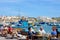 Quayside restaurants and harbour view, Marsaxlokk.