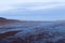 Quebec City and LÃ©vis in the distance seen from the Island of Orleansâ€™ tidal flats during an blue hour dawn